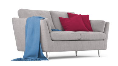 Szara kanapa z czerwonymi poduszkami i niebieskim kocem