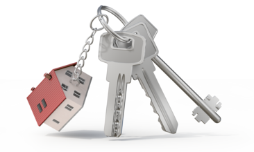 Klucze do mieszkania lub domu symbolizujące ubezpieczenie na życie do kredytu hipotecznego