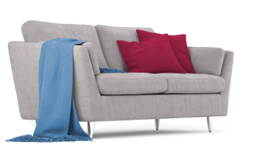 Sofa z poduszkami i niebieskim kocem