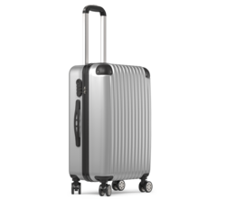 Srebrna, aluminiowa walizka symbolizująca podróż służbową ubezpieczoną w Warcie